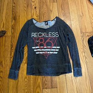Young and Reckless pullover. Size Large.